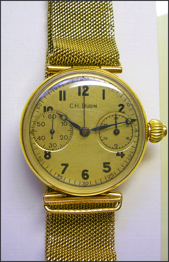 Valjoux caliber 23 chronograph wrist watch circa 1930.
				Case and fine mesh bracelet are 18 karat yellow gold.